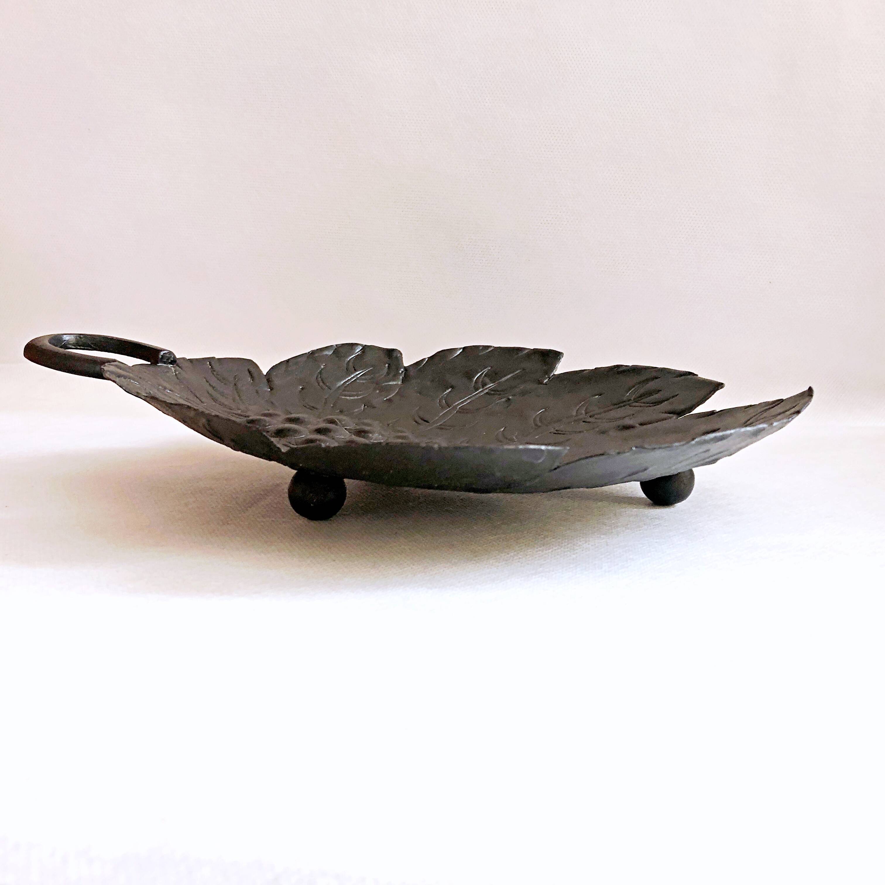 Artisanal embossed metal tripod dish