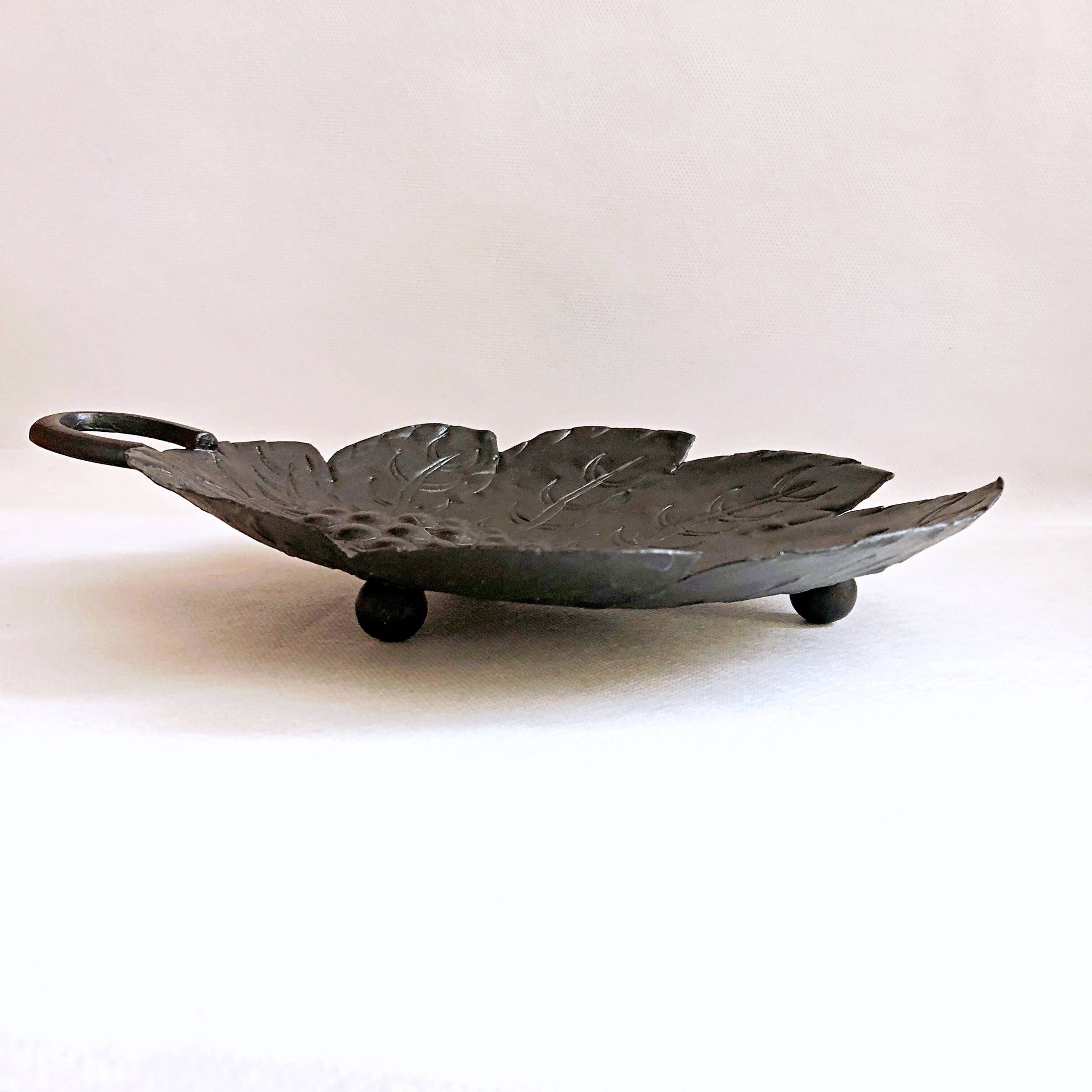 Artisanal embossed metal tripod dish