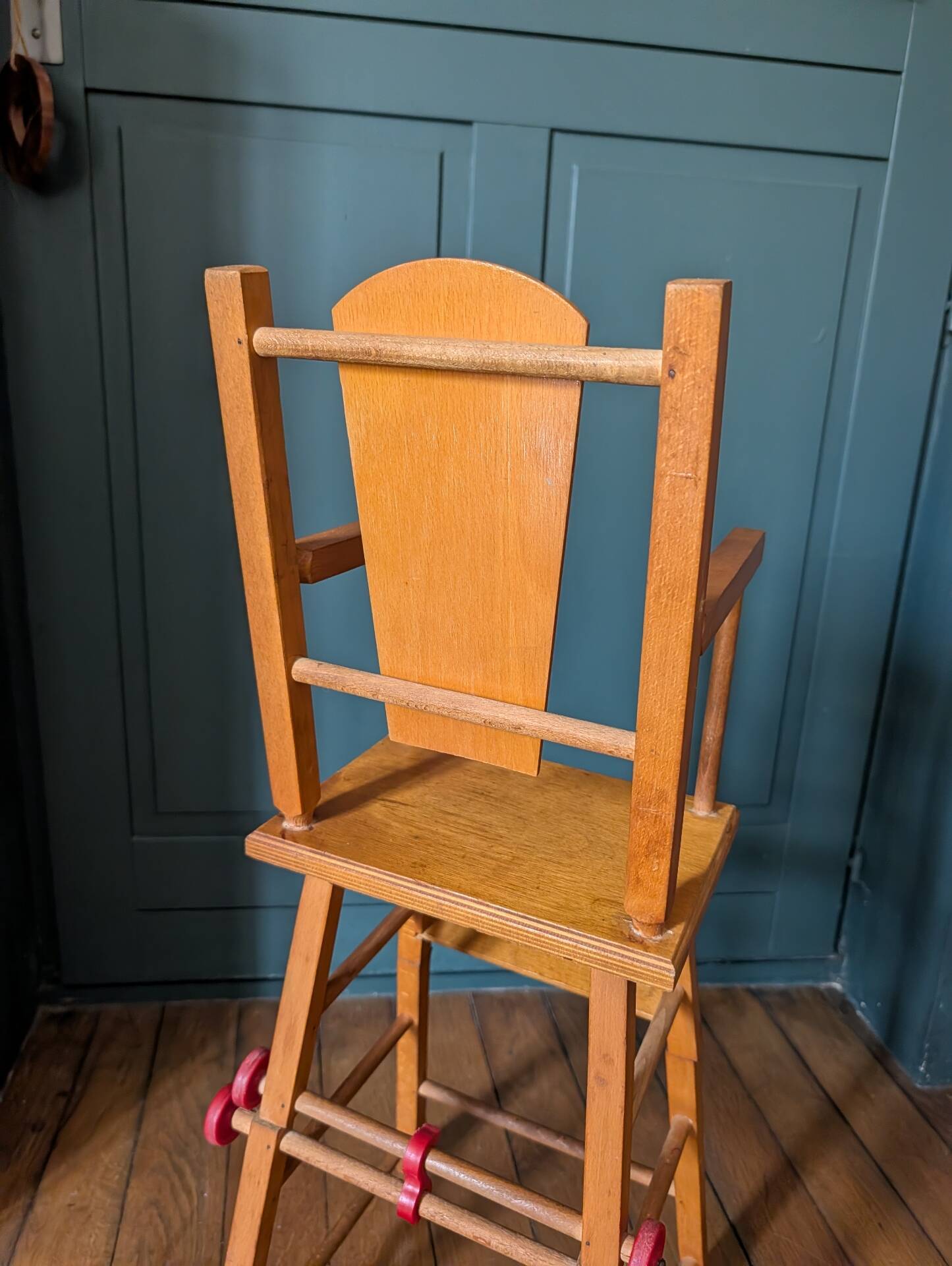 Doll high chair in wood – 1970s, foldable and on wheels