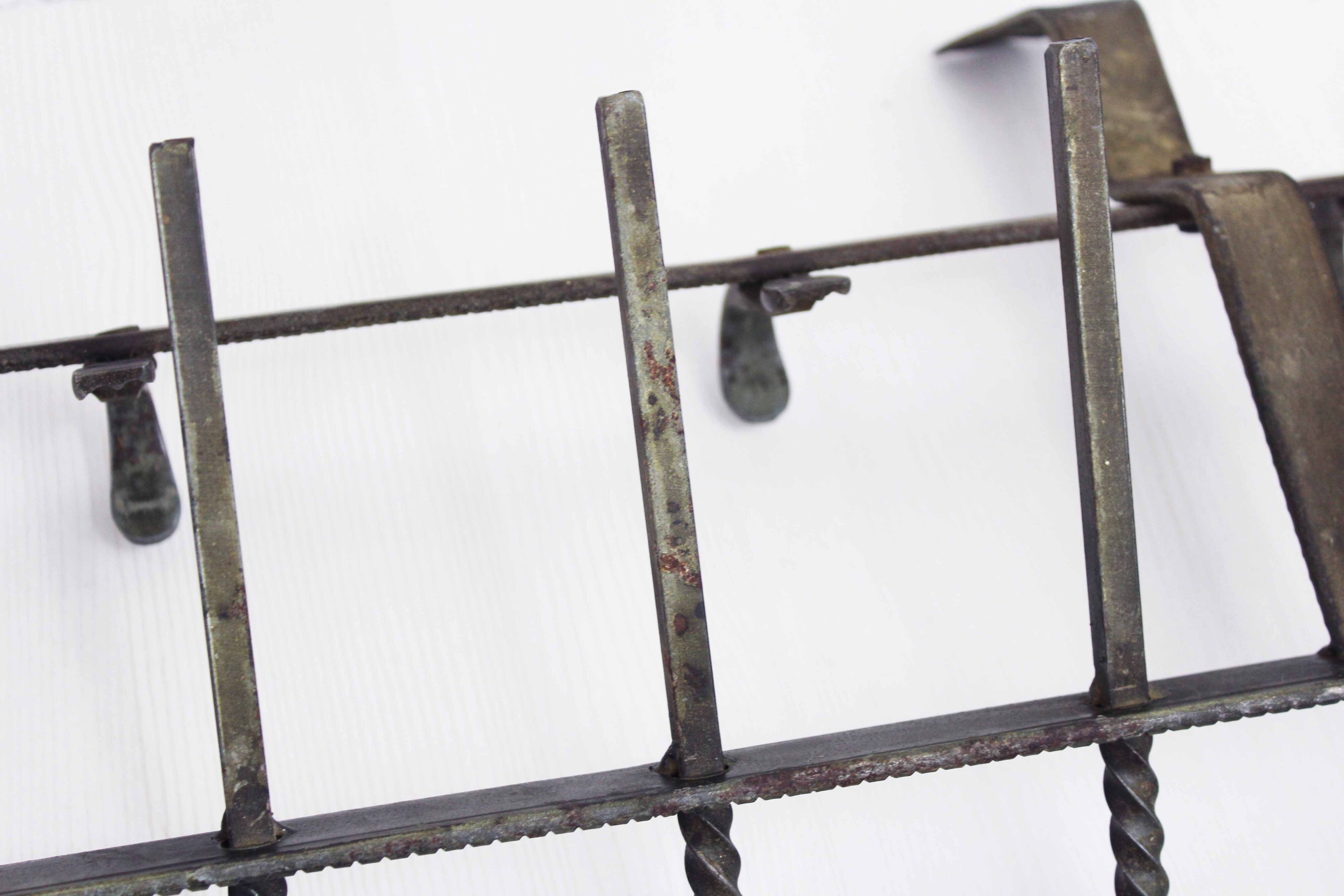 Metal wall coat rack