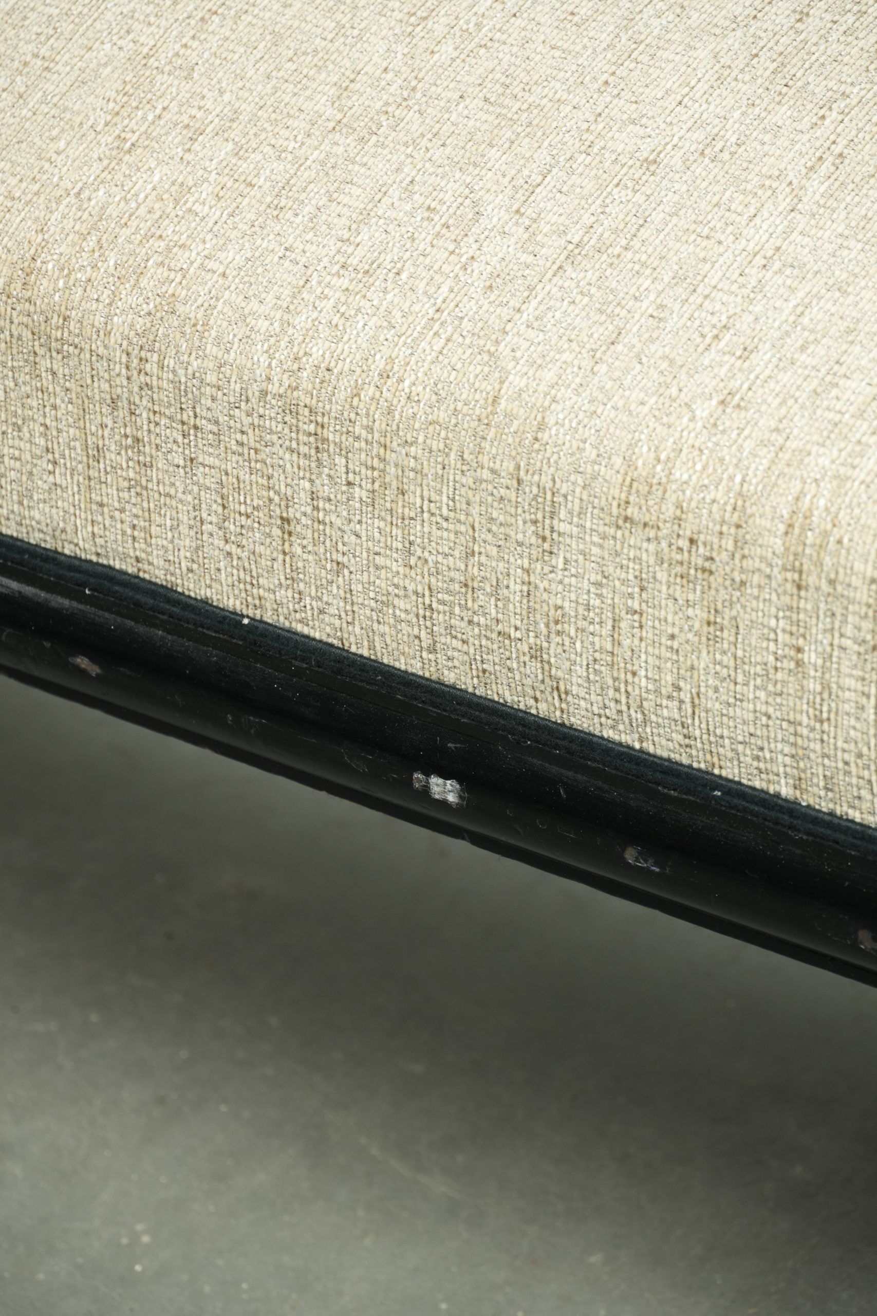 French sofa from the 19th century in Empire style with detailed armrests