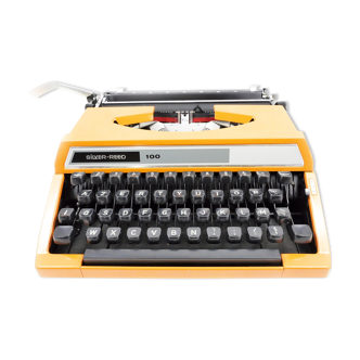 Machine à écrire orange silver reed 100 vintage