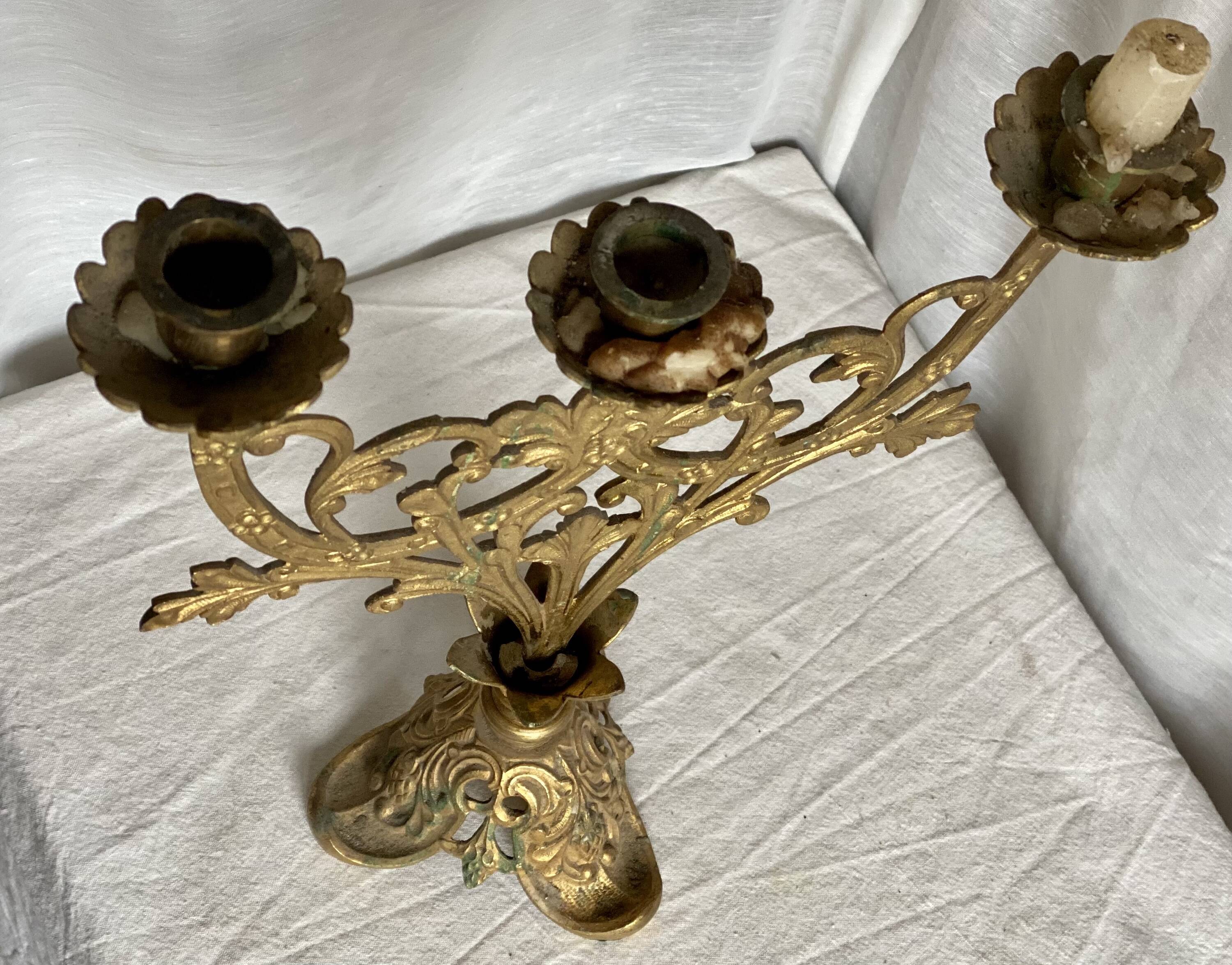 Set of 3 gilt metal candlesticks from the early 20th century.