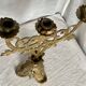 Set of 3 gilt metal candlesticks from the early 20th century.