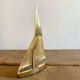Golden brass sailboat