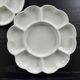 Paire de plats fleurs en porcelaine