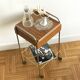 Serving bedside in gold metal and formica