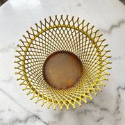 Mathieu Matégot round metal cache pot in yellow, France 1950s