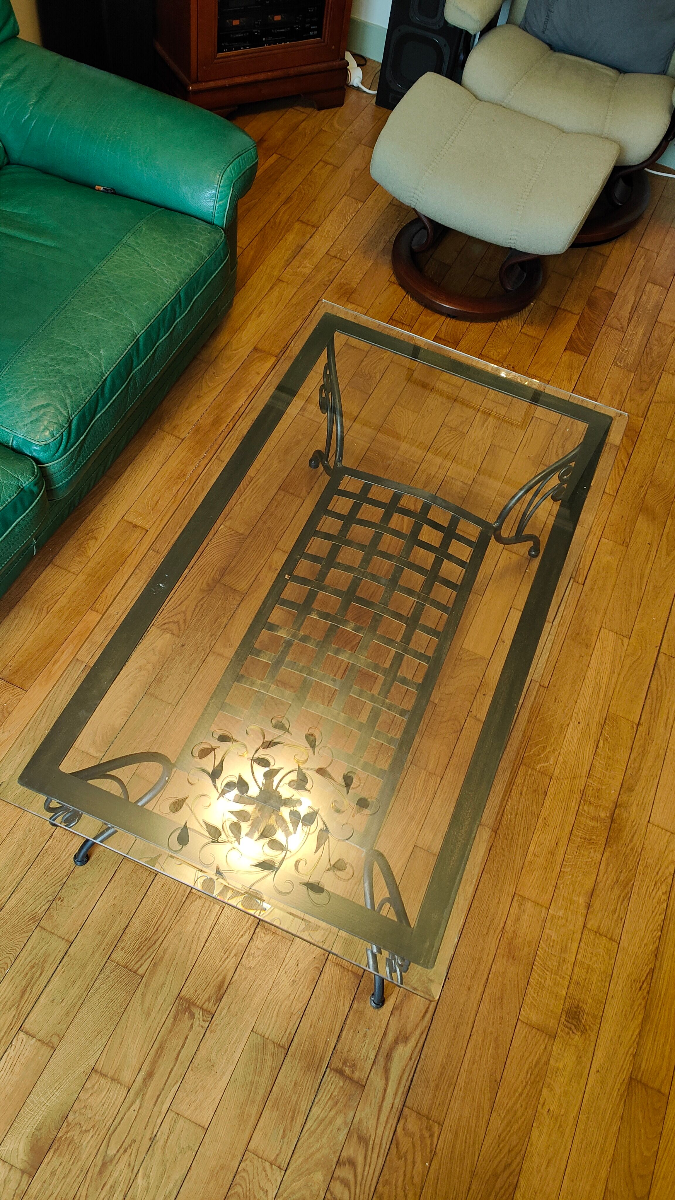 Black wrought iron coffee table and Roche Bobois glass top