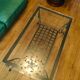 Black wrought iron coffee table and Roche Bobois glass top