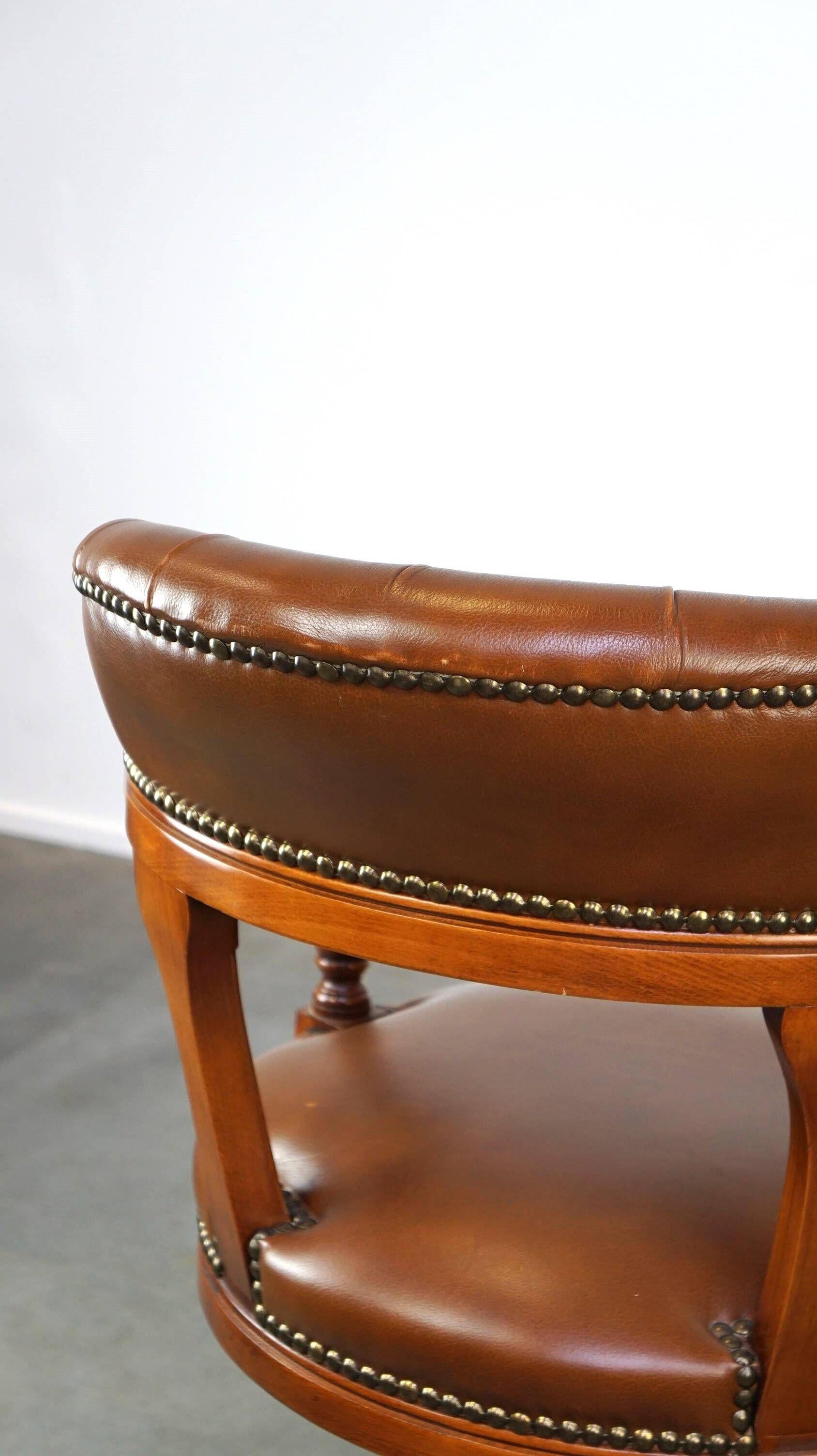 Swivel English style Chesterfield armchair/office chair in brown cowhide