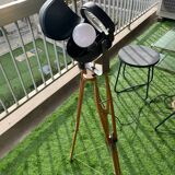 Floor lamp in the style of a cinema projector.