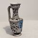 Small vase in fat lava style