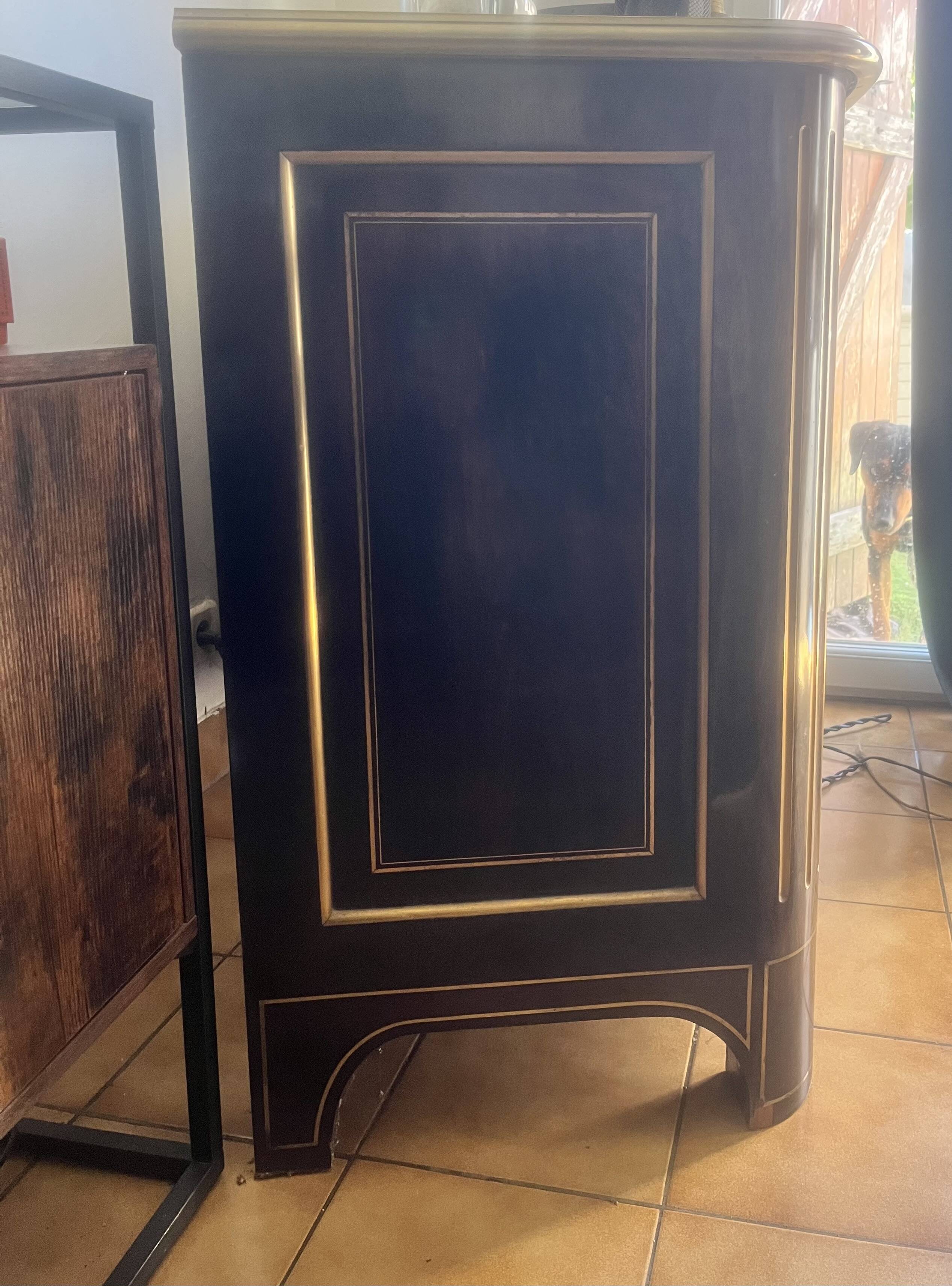1970s commode in black lacquer and bronze/brass.