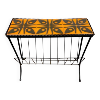 Orange ceramic and metal magazine rack from the 1970s.