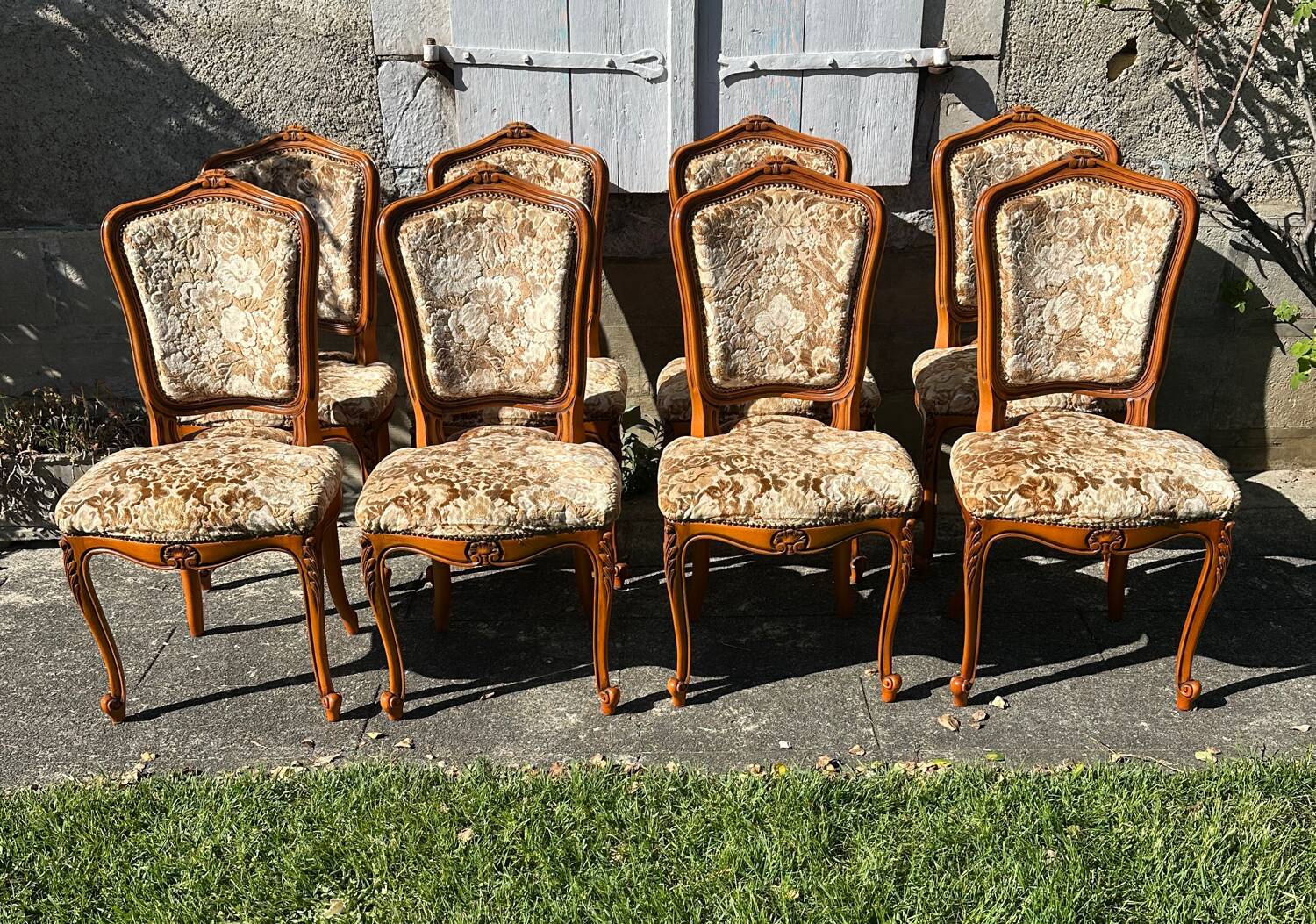 8 cherry wood chairs in Louis XV style with velvet upholstery.