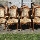 8 cherry wood chairs in Louis XV style with velvet upholstery.