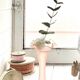 Vase en verre poli rose