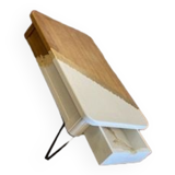 Coffee table with pin legs and gold leaf