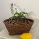 Vintage wicker and cane basket in bohemian style
