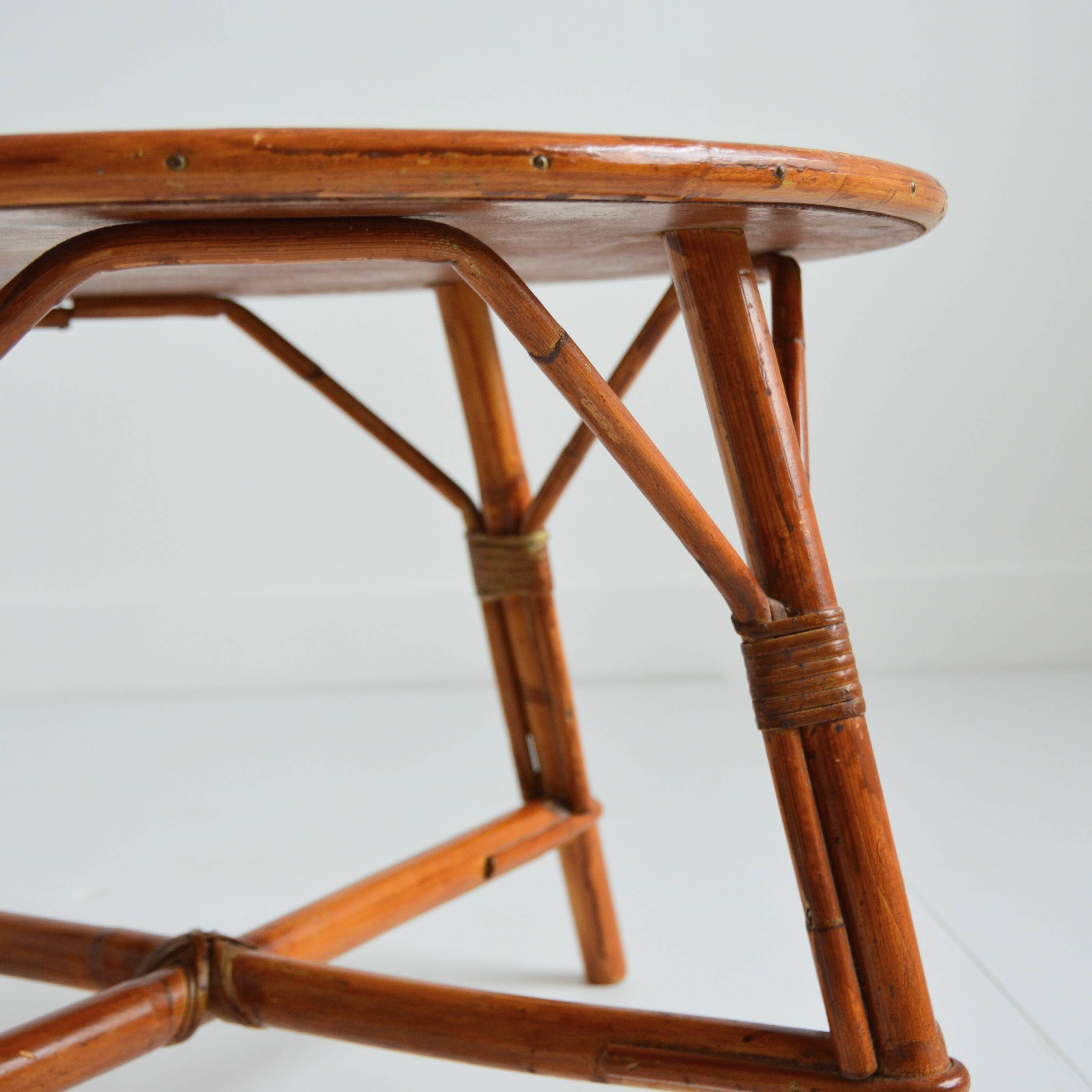 Vintage 1960s round wood and rattan coffee table