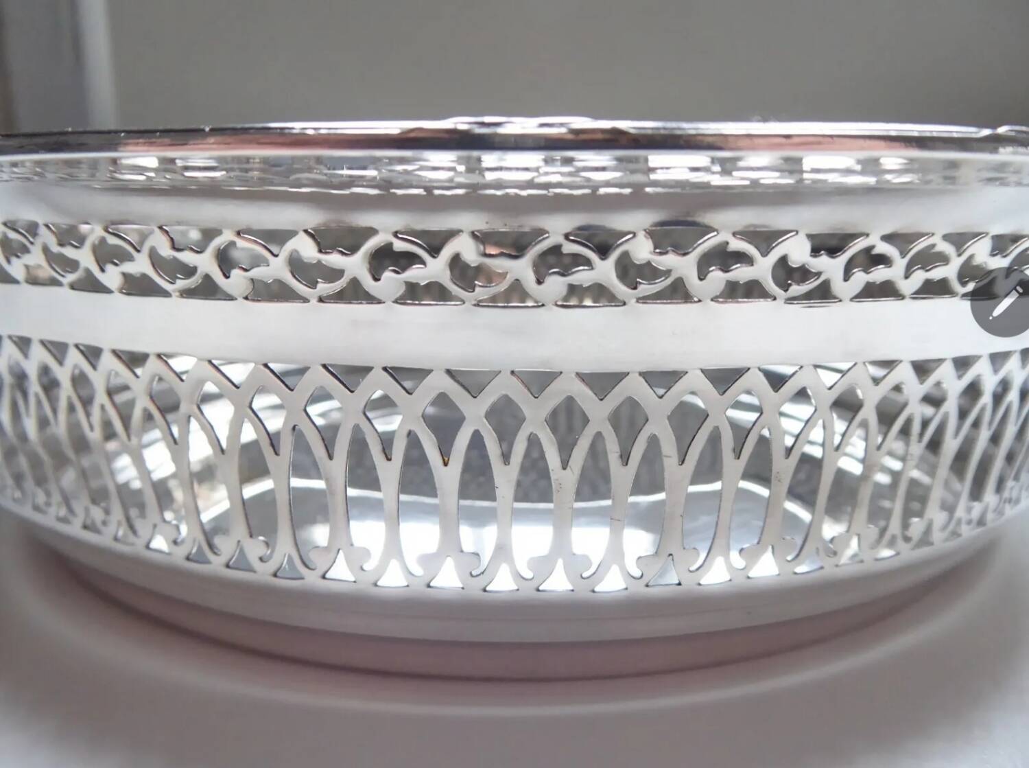 Large openwork basket in silver metal