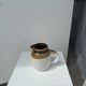 Small two-tone white and brown pitcher Made in China