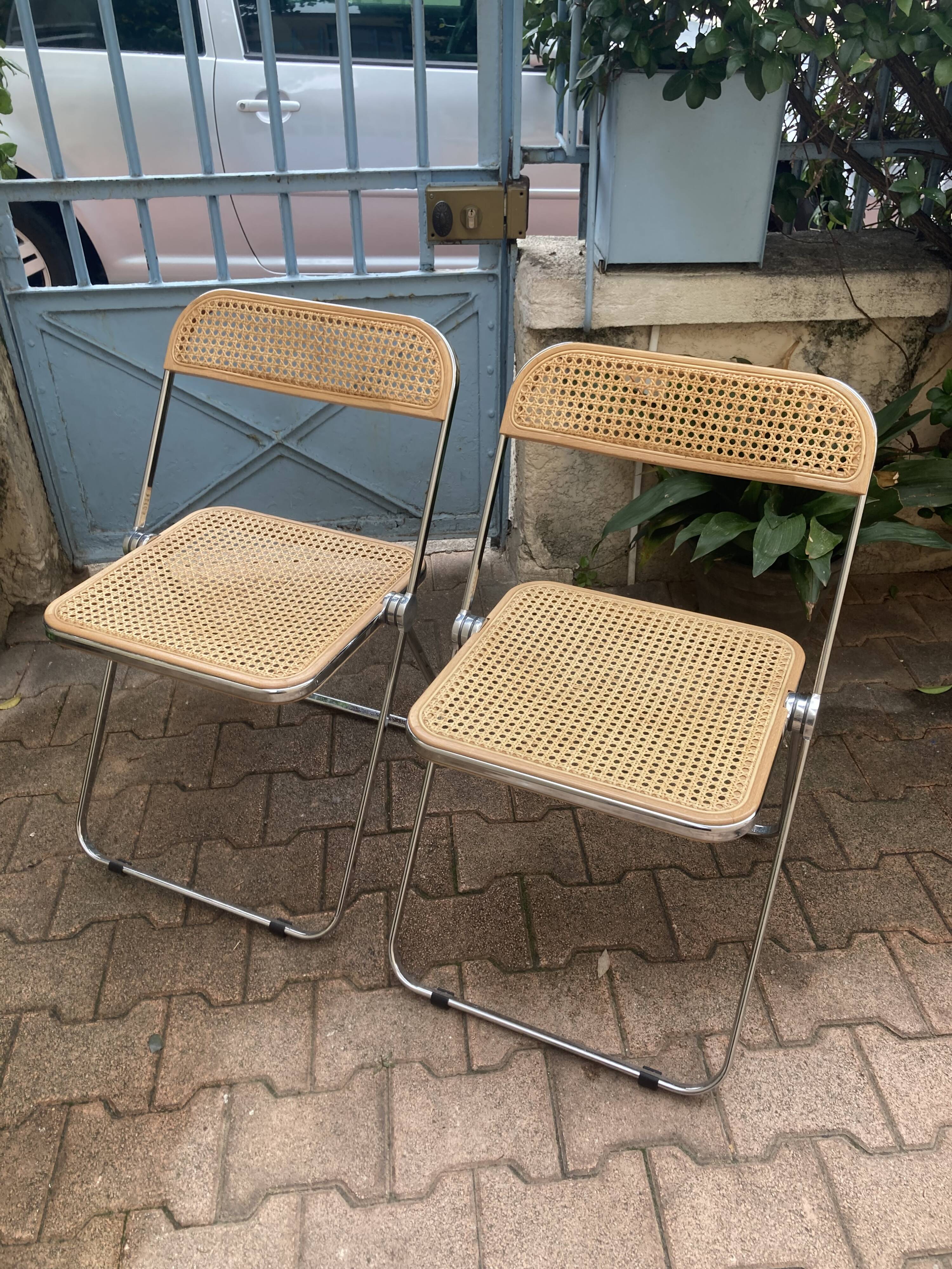 Plia chairs by Castelli in wood and cane.