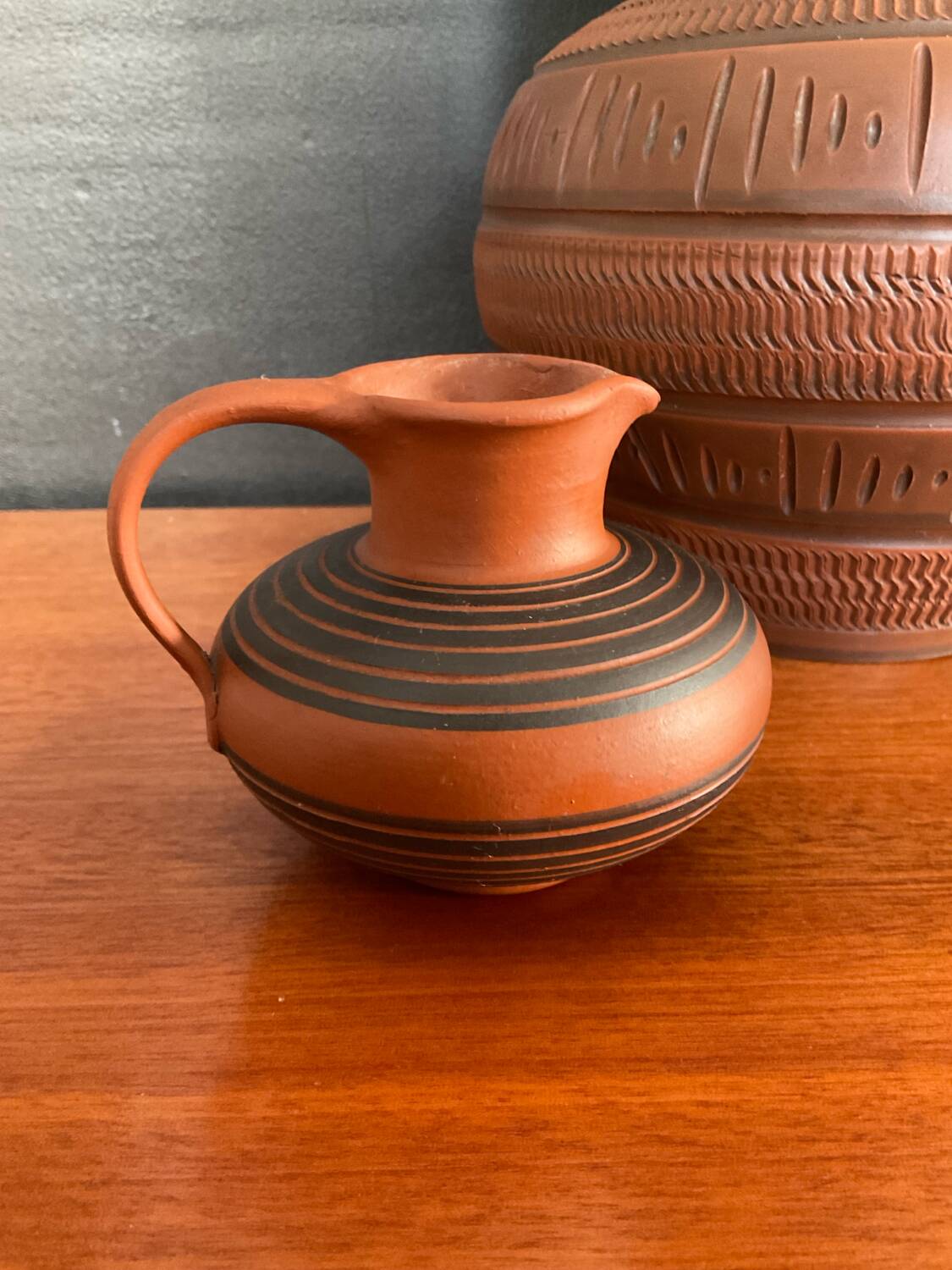 Trio of vintage vases in chiselled terracotta