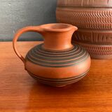 Trio of vintage vases in chiselled terracotta