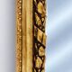 Large gold full-length mirror with ornate crest