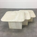 Three travertine trundle coffee tables