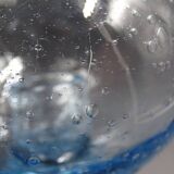 Candlestick or photophore in sky blue bulled glass, signed Biot