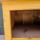 Low storage unit in saffron yellow wood – Canadian handcrafted.