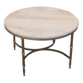 Round neoclassical coffee table with a marble top and golden metal base.