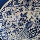 Majestic peacock plate from Dutch earthenware