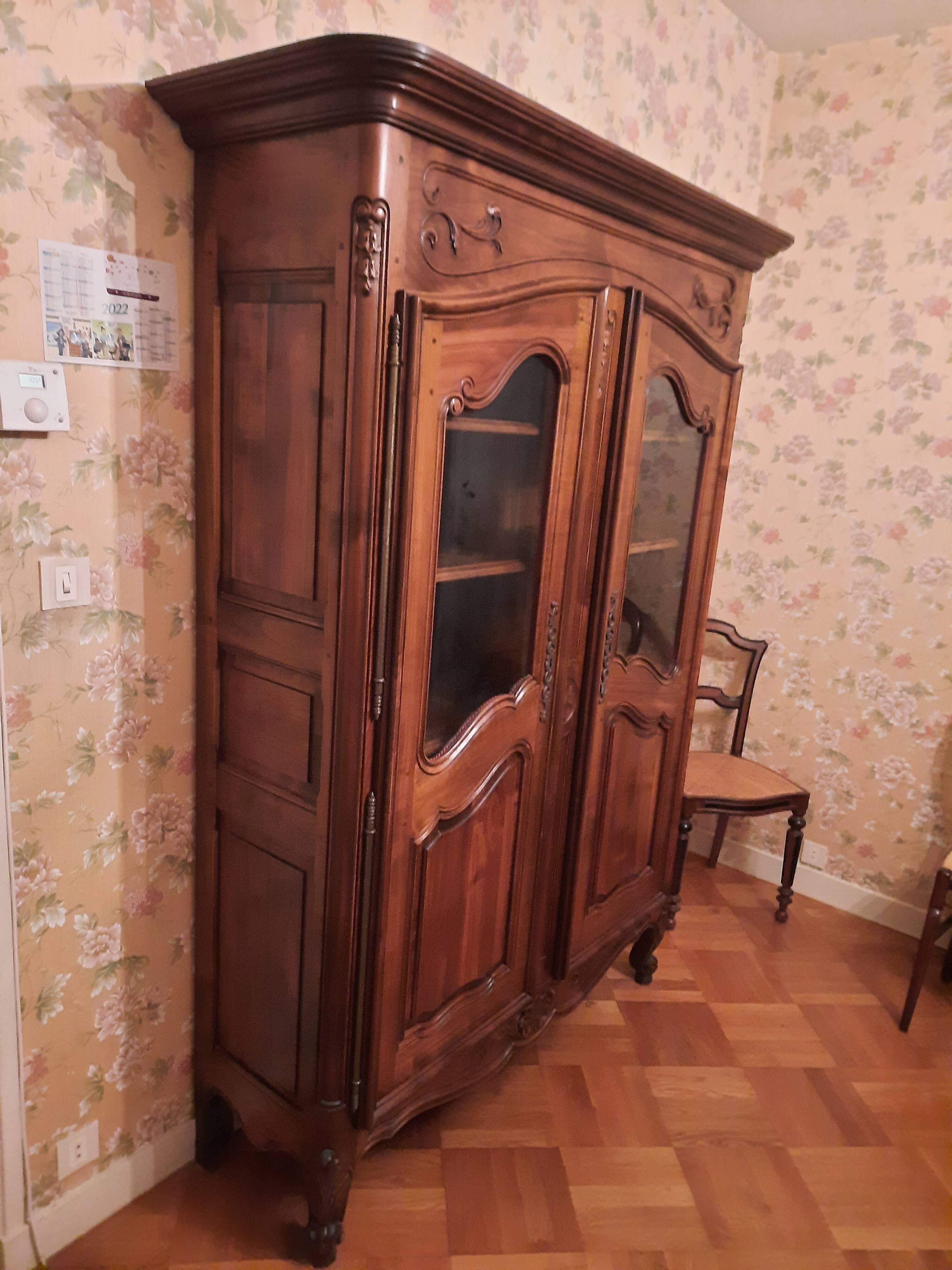 Regency bookcase in solid cherry wood stained walnut.