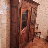 Regency bookcase in solid cherry wood stained walnut.