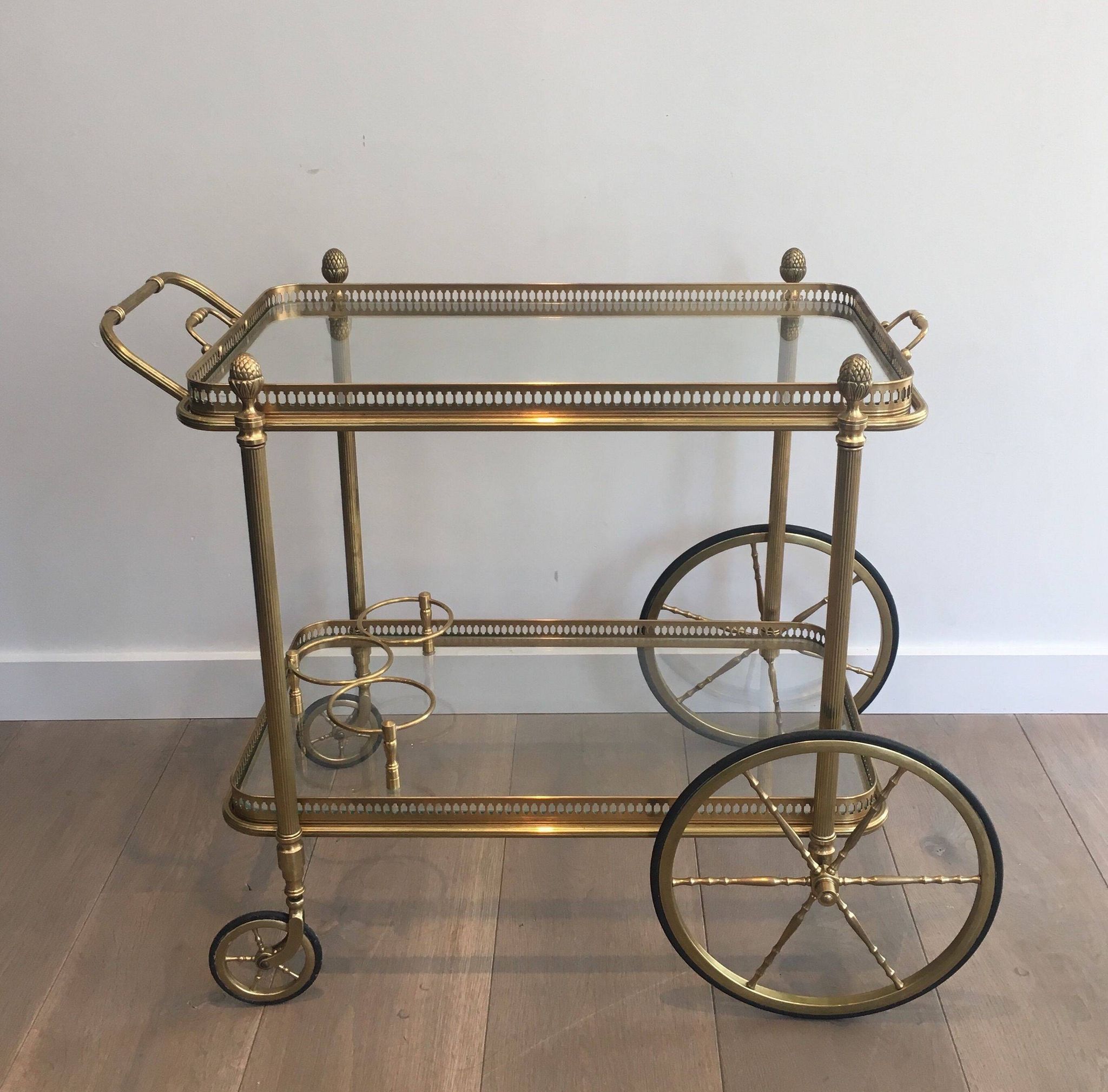 Neoclassical brass rolling table from Maison Baguès