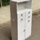 White bathroom storage cabinet from the 80s
