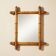 Wooden turned mirror in bamboo style, circa 1900-1930.