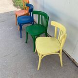 4 multi-colored bistro chairs