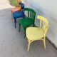 4 multi-colored bistro chairs