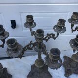 4 identical old brass candlesticks