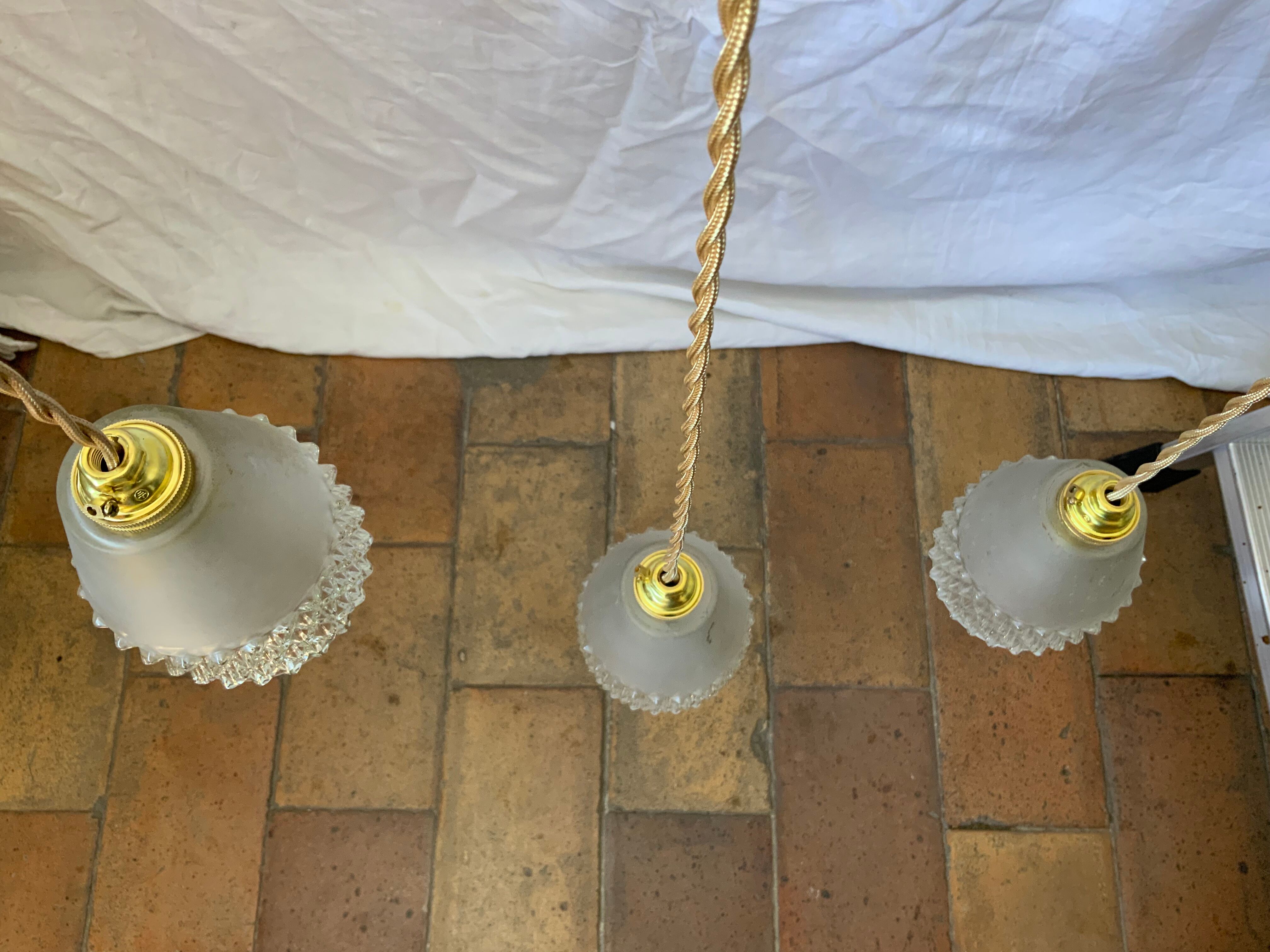 Trio of vintage suspensions