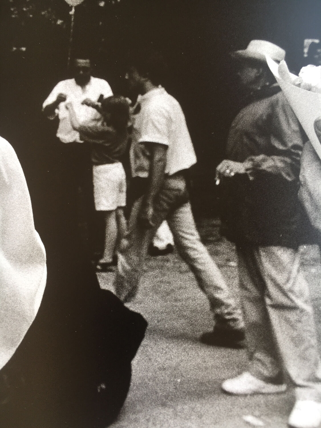 Photograph.woman with hat at funfair, 90s
