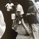 Photograph.woman with hat at funfair, 90s