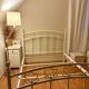 Double bed "Tulipes" in white metal from the 2000s.