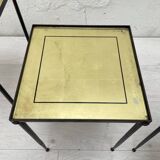 Suite of metal and glass nesting tables.