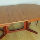 Scandinavian style oval table in central foot with extensions